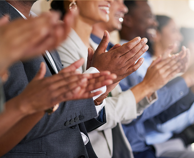 business people cheering and clapping