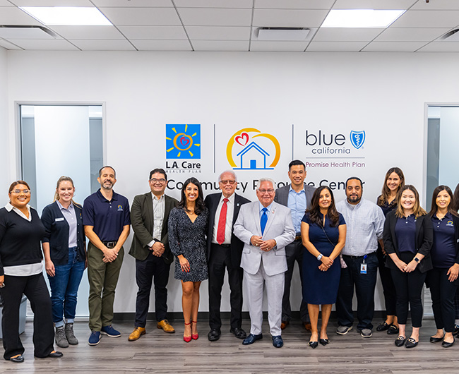 Group Photo of L.A. Care staff with Senator Bob Archuleta