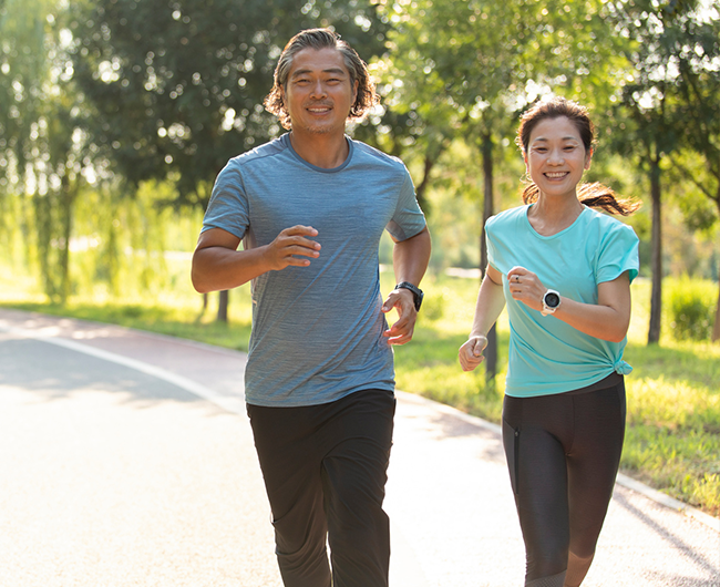 couple exercising at the park