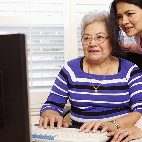 mom and daughter at computer