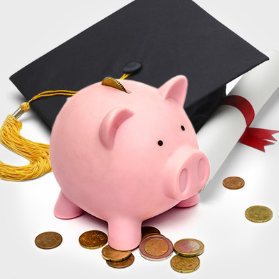 a piggy bank and a graduation cap with coins around them