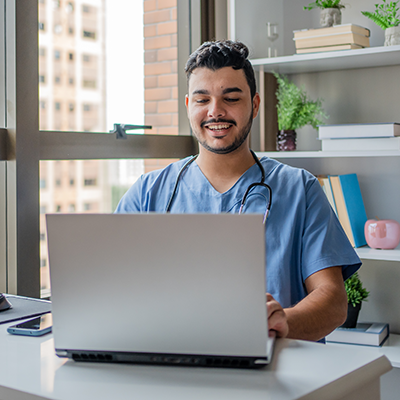 homecare worker on laptop