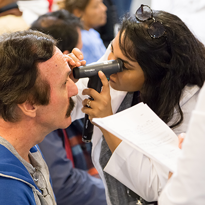 provider doing eye exam