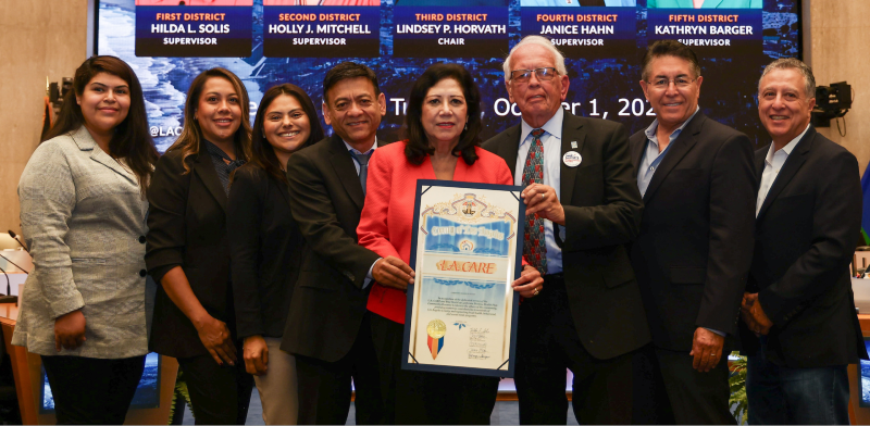 Supervisor Hilda Solis with John Baackes, L.A. Care CEO, Al Ballesteros, L.A. Care Board Chair, and Community Resource Center team