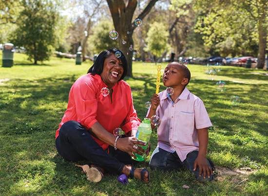 Shop Plans Grandmother and Grandson Blowing Bubbles