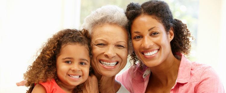 Smiling grandmother, mother and child